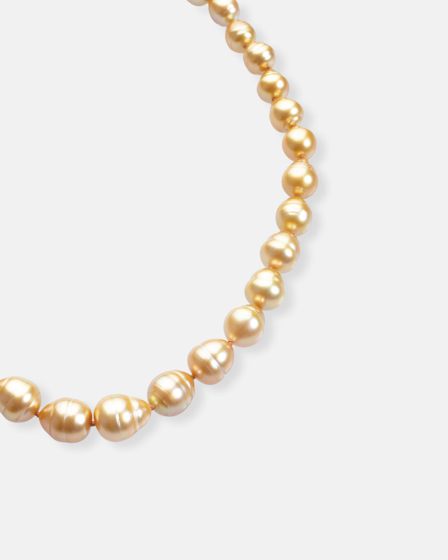 golden circled pearl necklace