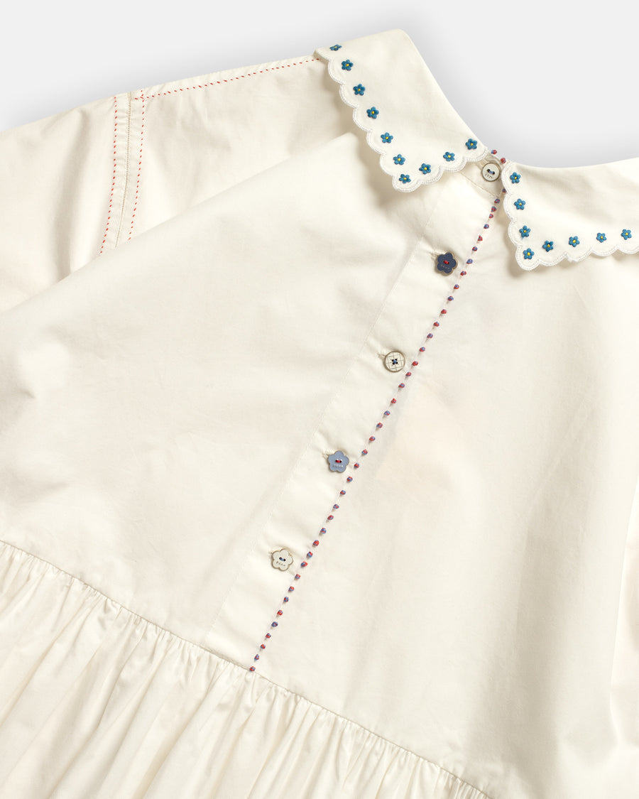 embroidered top with scallop edge