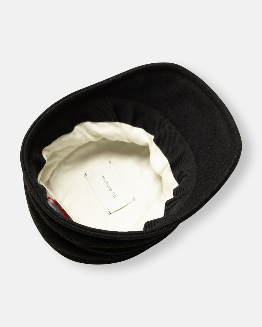 melton drape cap
