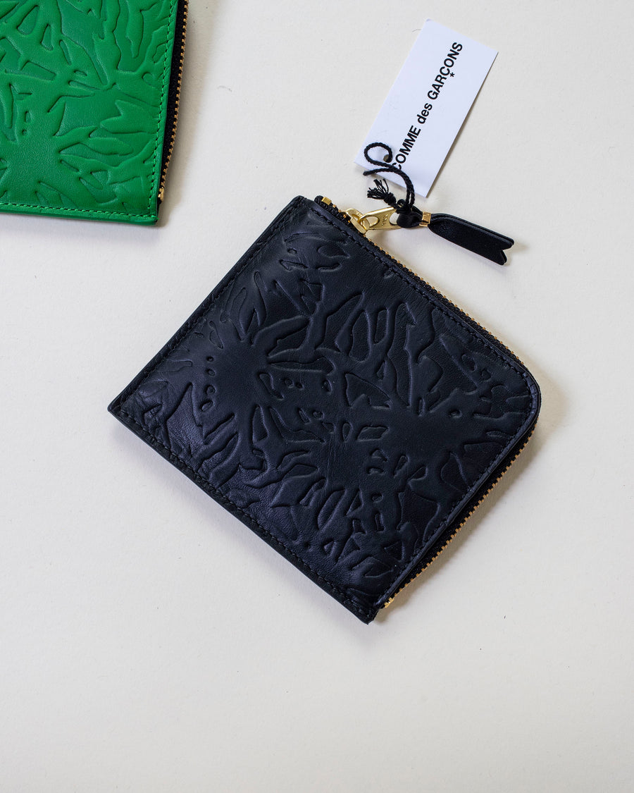 embossed forest half zip wallet